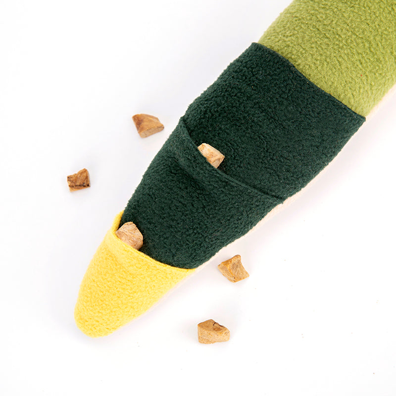 Dog foraging for treats in the snuffle snake fleece folds