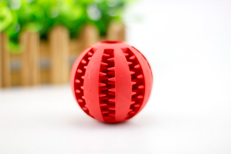 Rubber Treat-Dispensing Ball for Dogs - dog chewing toy