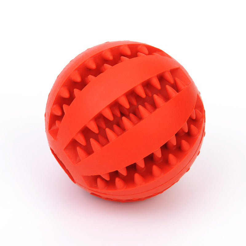 Rubber Treat-Dispensing Ball for Dogs - dog playing with ball