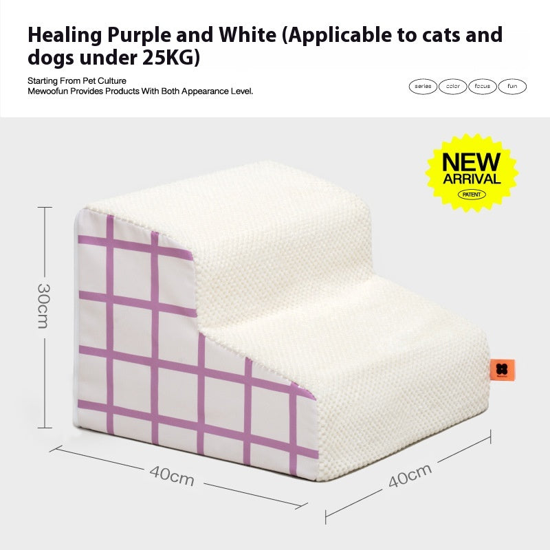 Dog using plush pet steps to climb onto a bed