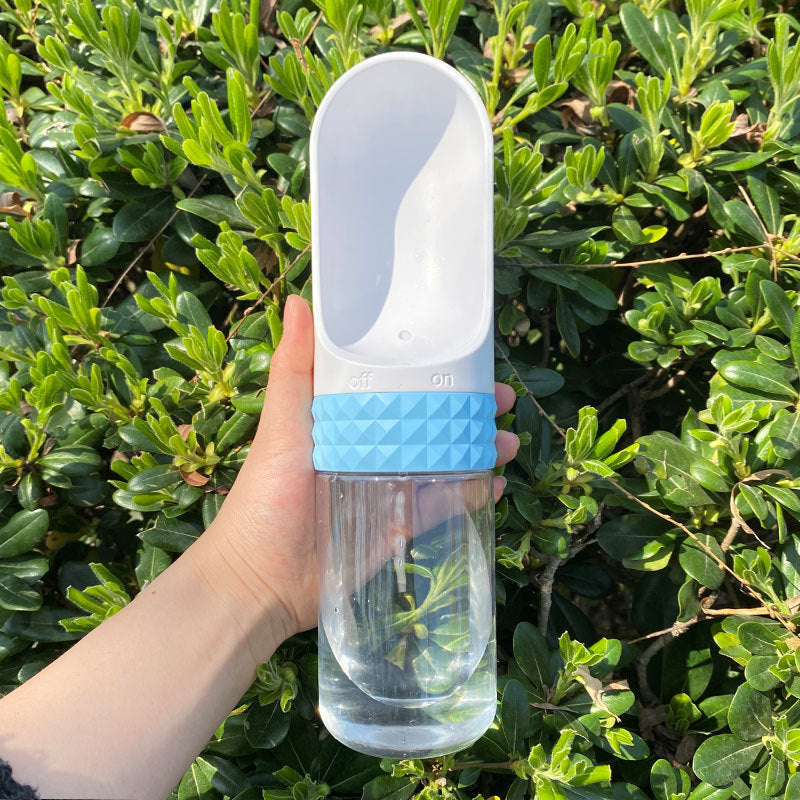 Blue portable dog water bottle for outdoor travel