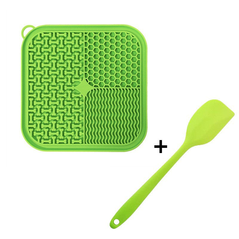 Green silicone slow feeder lick mat for pets