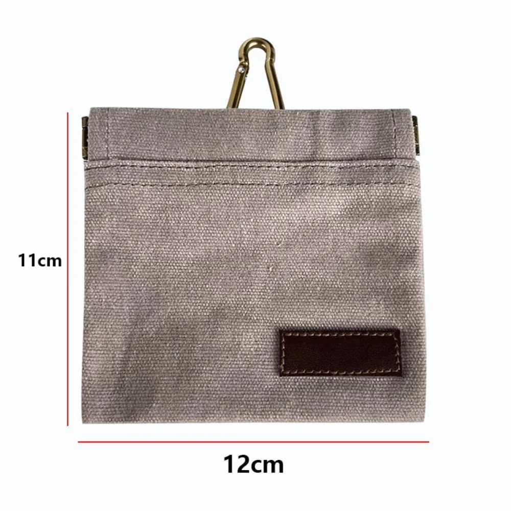 Dog training treat pouch clipped to a belt