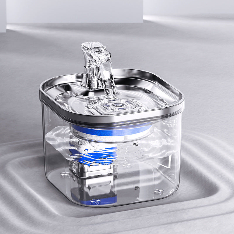 Cat drinking from stainless steel water fountain